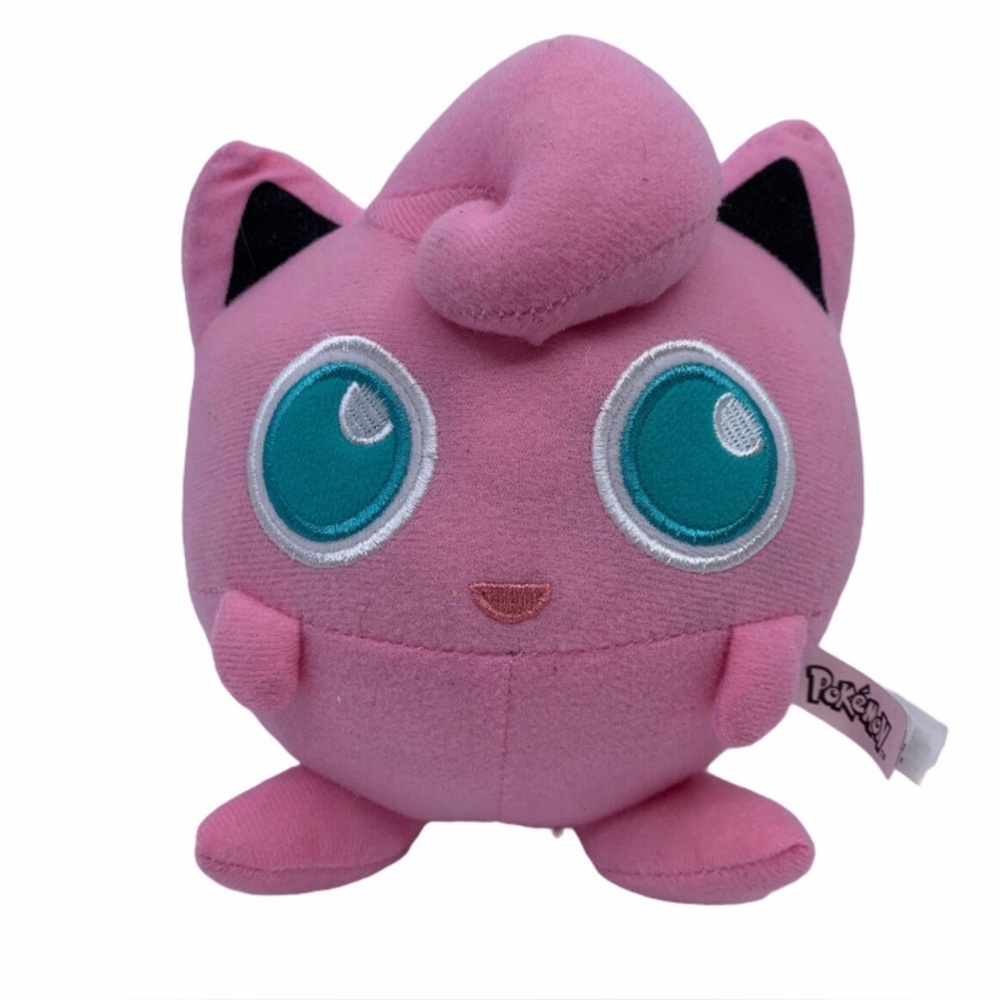 This is a plush toy of Jigglypuff, a Pokémon from the popular franchise.